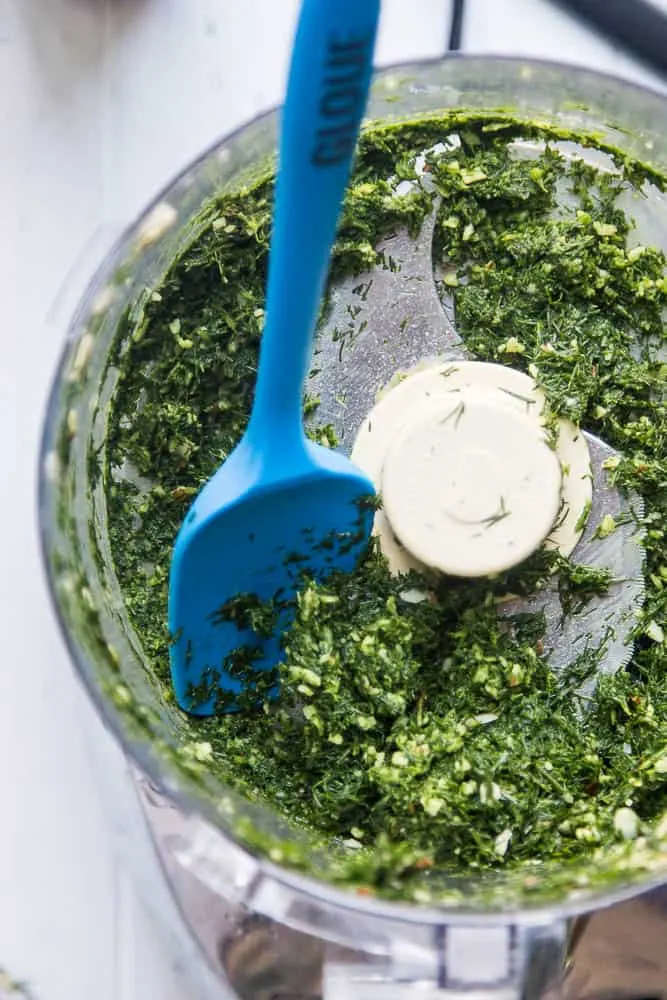 Dairy-Free Dill Pesto is a fun twist on traditional basil pesto. It's perfect to spread over grilled summer vegetables, stir into potato salads, or into some ranch for a super dill-infused salad dressing! | perrysplate.com | paleo recipes | keto recipes | Whole30 recipes