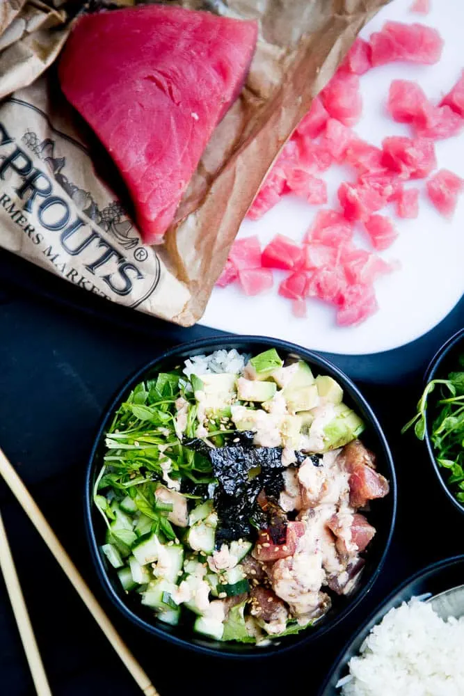 These easy Ahi Tuna Poke Bowls with Spicy Mayo are a quick dinner idea and are naturally gluten and soy-free! They can also be made to be paleo, keto, or Whole30 compliant. | perrysplate.com | poke bowl recipes | paleo recipes | Whole30 recipes | keto recipes