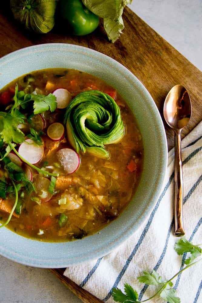 This Instant Pot Chicken Tomatillo Soup is perfect all year round! It's a perfect #paleo, #keto, or #Whole30recipe. Just don't skimp on the avocados! | perrysplate.com