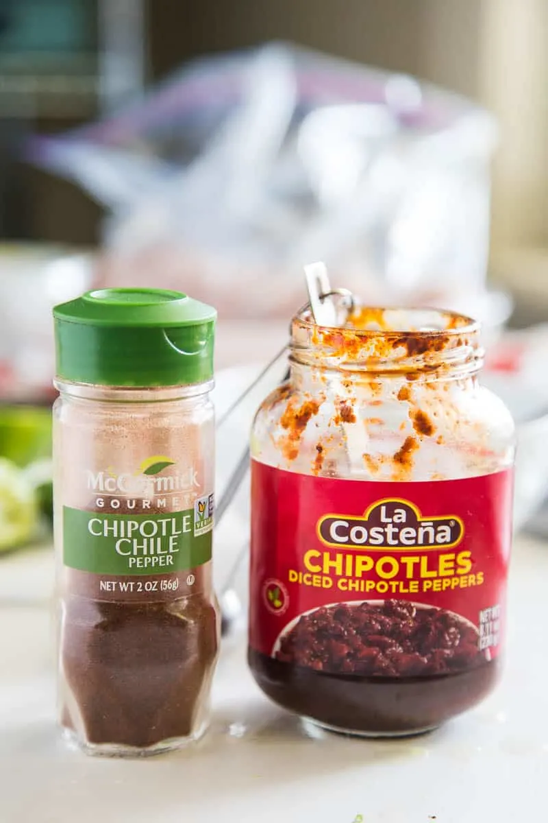 Chipotle-Lime Grilled Chicken with Strawberry Mango Salsa might be my favorite meal of the summer. It's easy to throw the chicken into a marinade ahead of time, and the kids all loved it! | perrysplate.com #grilledchicken #mangosalsa #summerrecipes