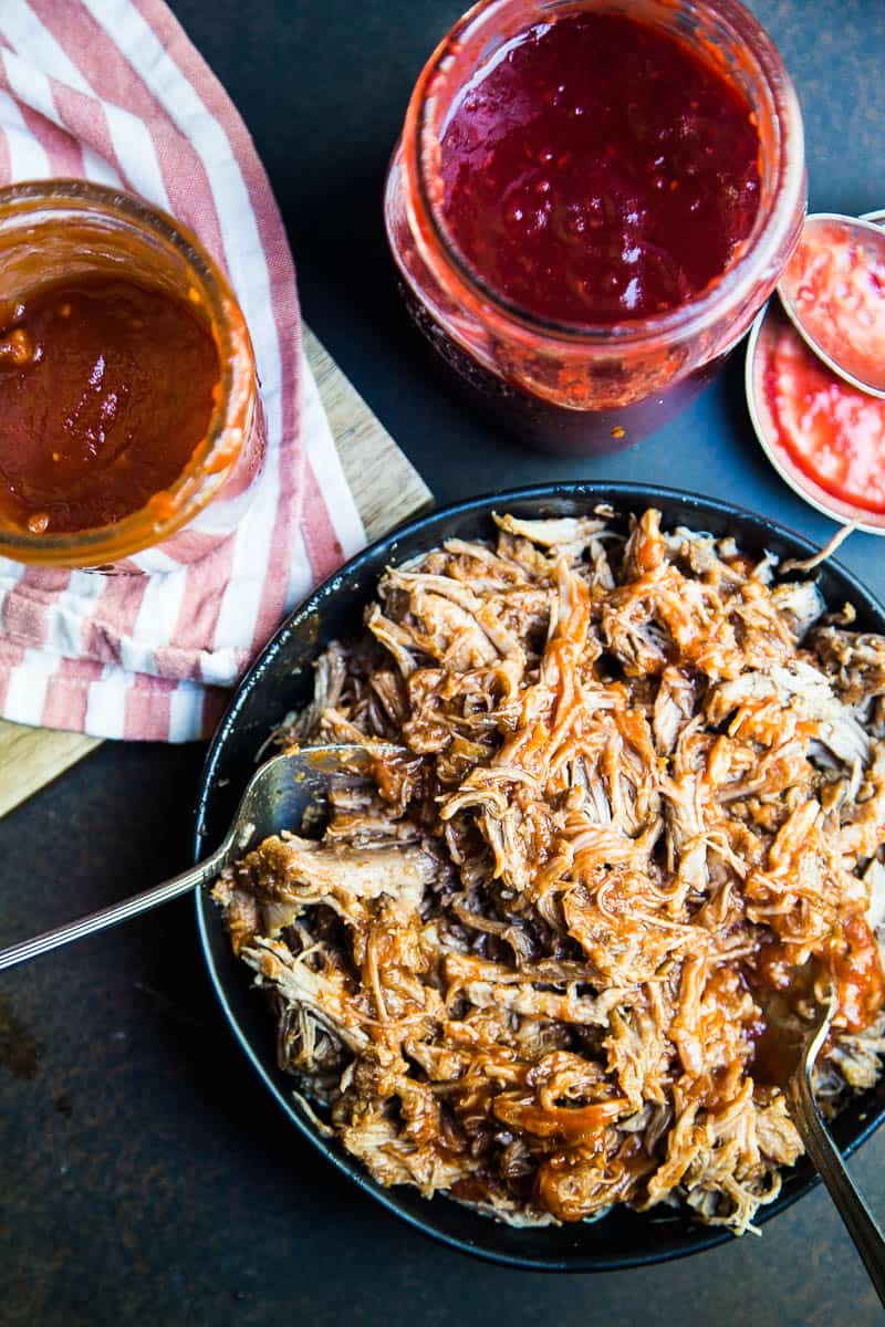 BBQ Pulled Pork is SO easy in an Instant Pot pressure cooker! You can turn a big pork roast into tender shreds of sweet BBQ in under 2 hours! | perrysplate.com #instantpot #bbqpulledpork