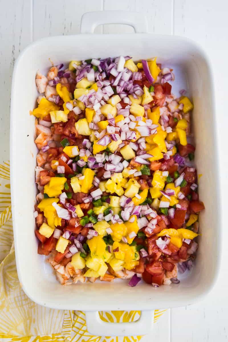 Ceviche is pretty fabulous on its own, but when you add a little diced pineapple and mango it takes it to a whole other level! | perrysplate.com #ceviche #shrimpceviche 