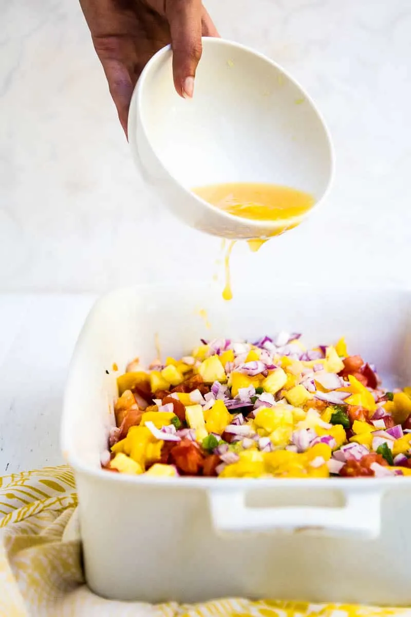 Ceviche is pretty fabulous on its own, but when you add a little diced pineapple and mango it takes it to a whole other level! | perrysplate.com #ceviche #shrimpceviche 