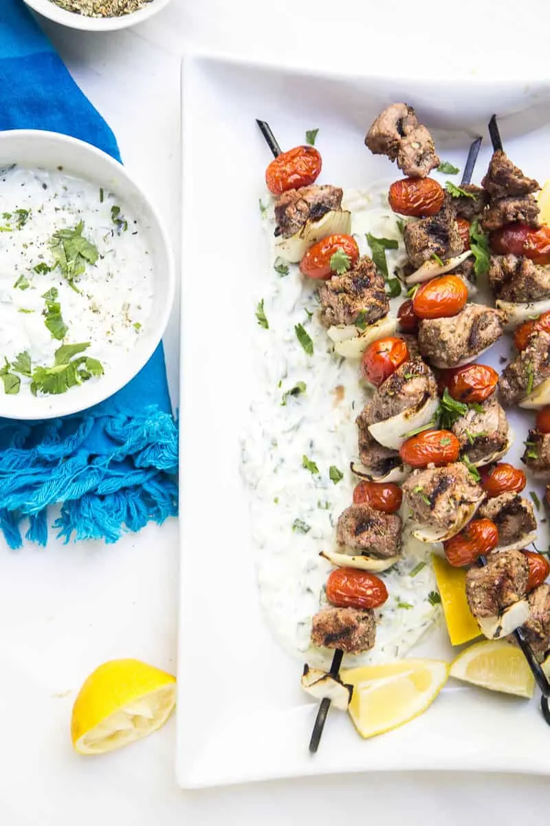 These Easy Greek Steak Kebabs are a quick meal that's great for busy weeknights or for a weekend dinner party! (Don't forget the homemade tzatziki!) | #grillingrecipes #steakrecipes #beefkebabs