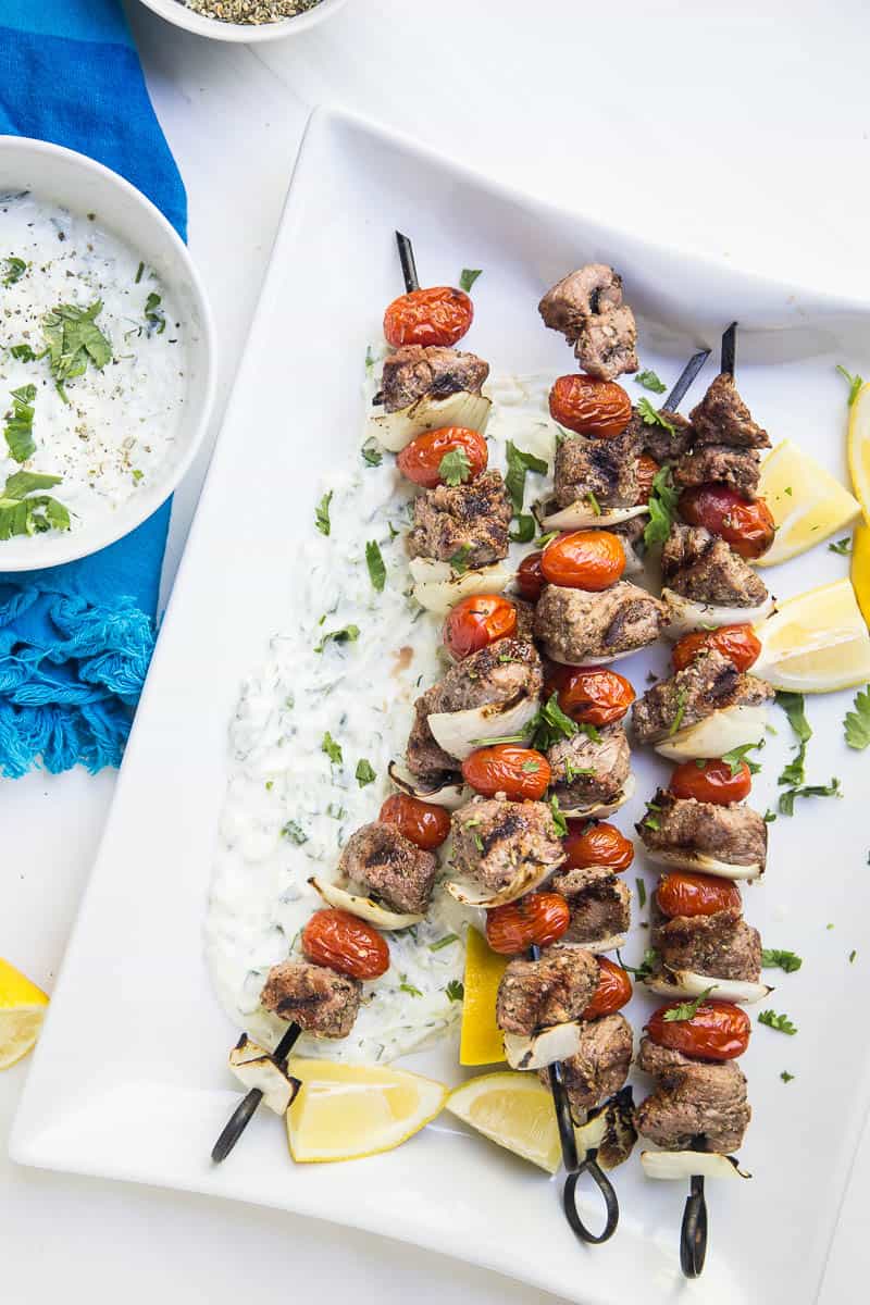 These Easy Greek Steak Kebabs are a quick meal that's great for busy weeknights or for a weekend dinner party! (Don't forget the homemade tzatziki!) | #grillingrecipes #steakrecipes #beefkebabs