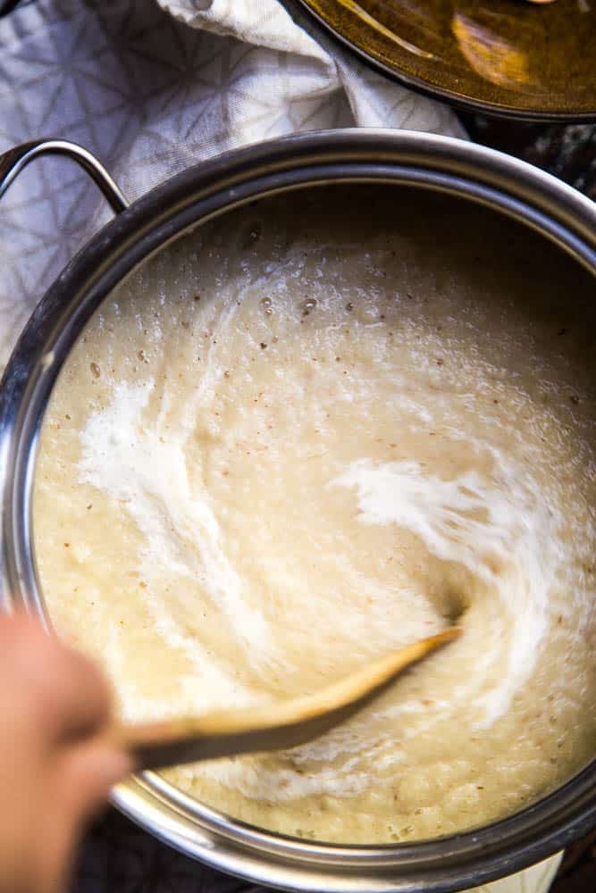 Cheesy Keto Roasted Cauliflower Soup only has a handful of ingredients and is a great recipe for meal prep or a busy weeknight! It's easily made Whole30 and paleo friendly, too! | perrysplate.com #ketorecipes #ketosoup #lowcarbrecipes