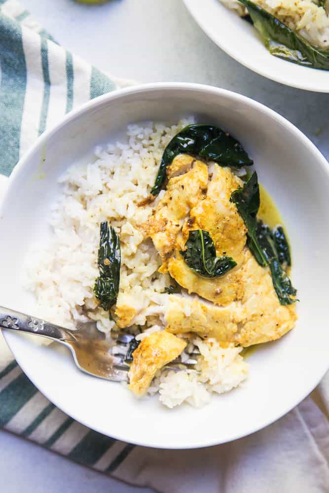 This one-pan Thai Coconut Fish Curry is a life-saver on a busy weeknight! Serve it up with some coconut rice (recipe link in the post!). | perrysplate.com #curryrecipe #thairecipes #weeknightdinnerrecipes