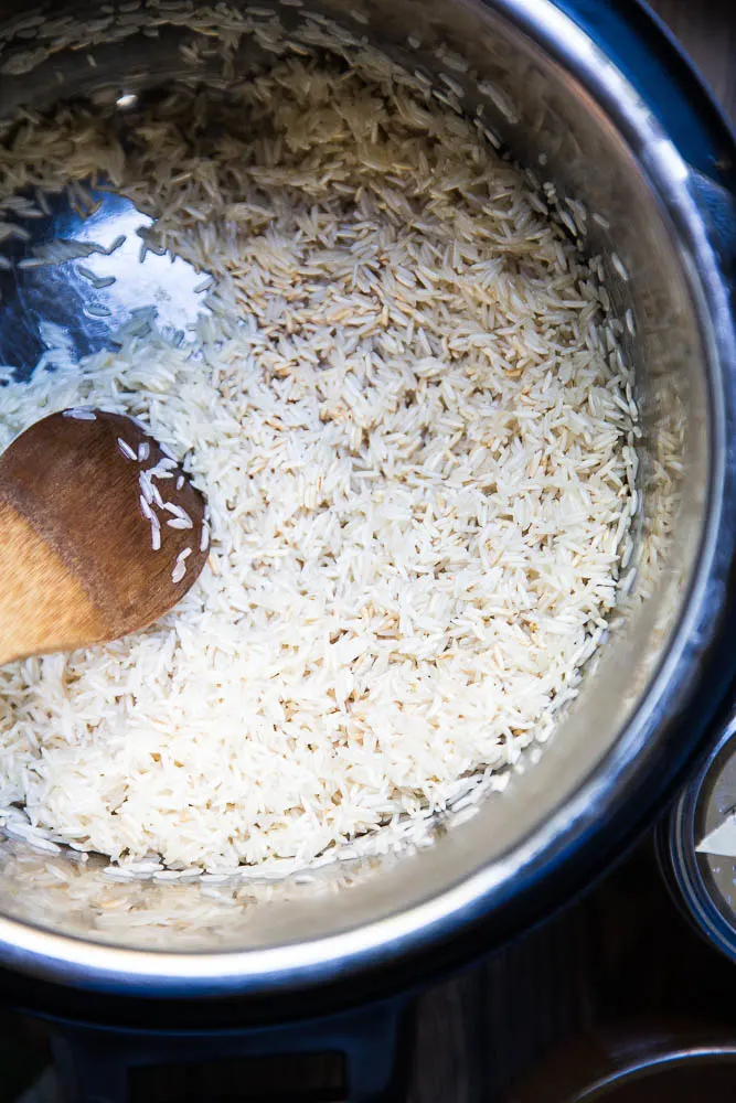 Toasting the rice for Instant Pot Cilantro Lime Rice | PerrysPlate.com