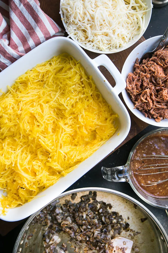 A perfect recipe for leftover BBQ pulled pork! It's also grain-free and easily made keto or low-carb friendly! | perrysplate.com #pulledpork #spaghettisquash #bbqpork