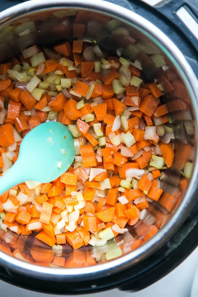 The EASIEST and best way to use leftover chicken! Lots of customizations for this tasty Instant Pot chicken soup! | perrysplate.com #instantpot #instantpotrecipes #chickensoup