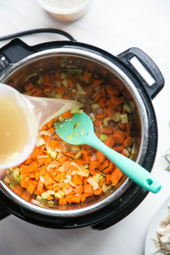 The EASIEST and best way to use leftover chicken! Lots of customizations for this tasty Instant Pot chicken soup! | perrysplate.com #instantpot #instantpotrecipes #chickensoup