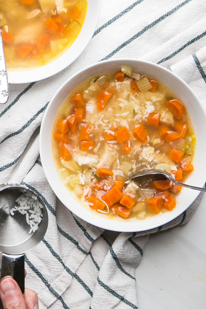 The EASIEST and best way to use leftover chicken! Lots of customizations for this tasty Instant Pot chicken soup! | perrysplate.com #instantpot #instantpotrecipes #chickensoup