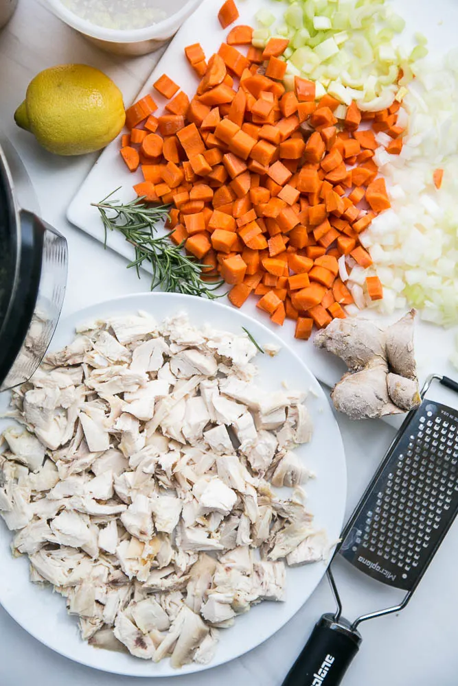 The EASIEST and best way to use leftover chicken! Lots of customizations for this tasty Instant Pot chicken soup! | perrysplate.com #instantpot #instantpotrecipes #chickensoup