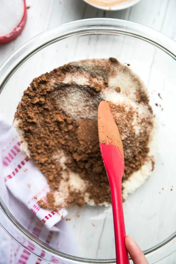 This 3-ingredient chocolate sugar scrub is a sweet little Valentine's Day gift for girlfriends, teachers, or just keep it for yourself. (Psst, it's edible. ;)) #homemadesugarscrub #sugarscrub #valentinesgifts | perrysplate.com