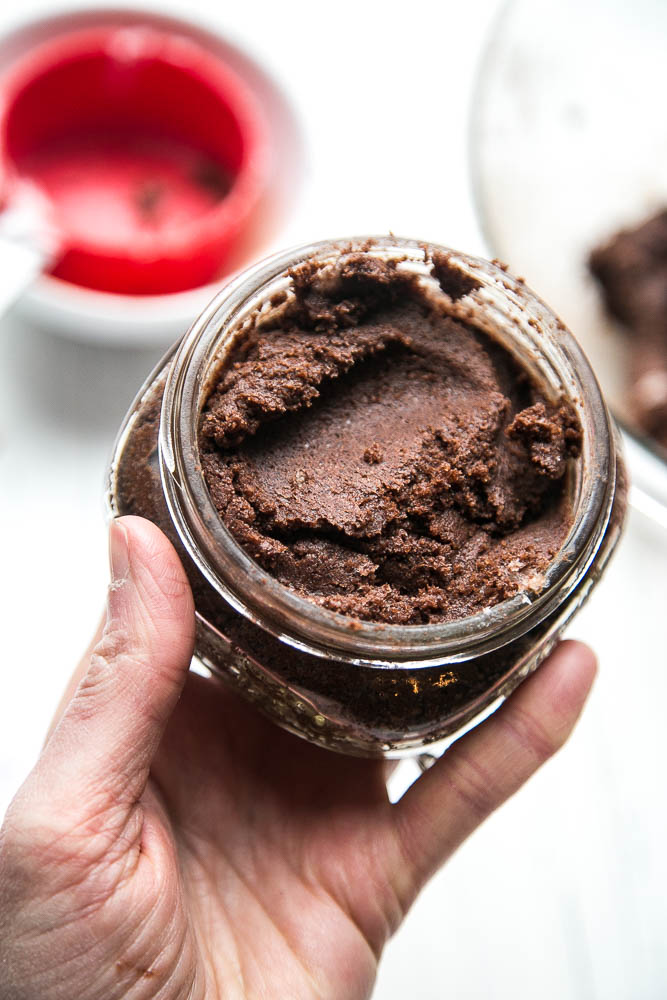 This 3-ingredient chocolate sugar scrub is a sweet little Valentine's Day gift for girlfriends, teachers, or just keep it for yourself. (Psst, it's edible. ;)) #homemadesugarscrub #sugarscrub #valentinesgifts | perrysplate.com