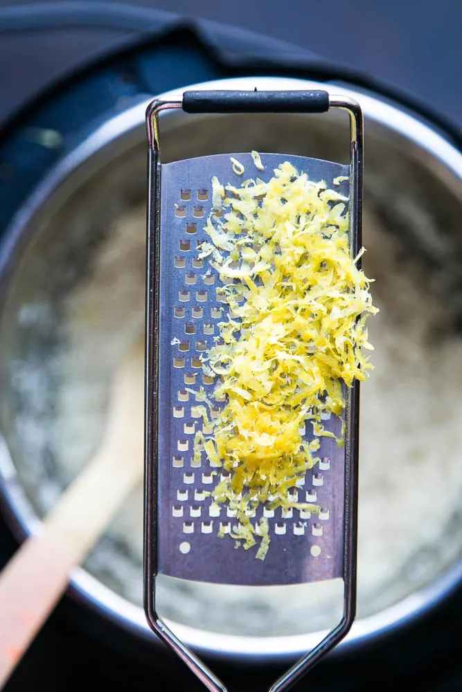 This EASY and versatile Instant Pot Lemon Herb Rice will be your go-to side dish. It's especially good with grilled chicken or seafood! | perrysplate.com #instantpot #instantpotrecipes #instapot