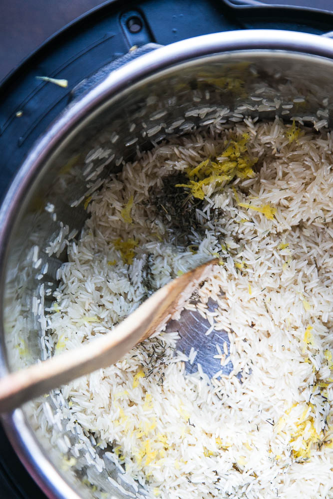 This EASY and versatile Instant Pot Lemon Herb Rice will be your go-to side dish. It's especially good with grilled chicken or seafood! | perrysplate.com #instantpot #instantpotrecipes #instapot