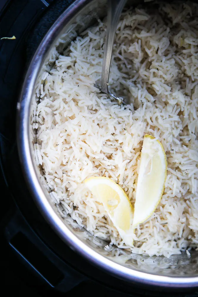 This EASY and versatile Instant Pot Lemon Herb Rice will be your go-to side dish. It's especially good with grilled chicken or seafood! | perrysplate.com #instantpot #instantpotrecipes #instapot