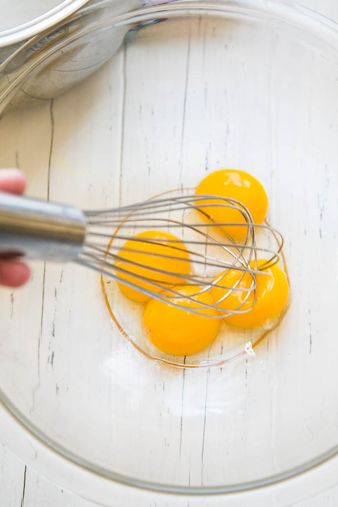 Tempering egg yolks to make homemade custard is easy! You'll have silky smooth custard in no time.