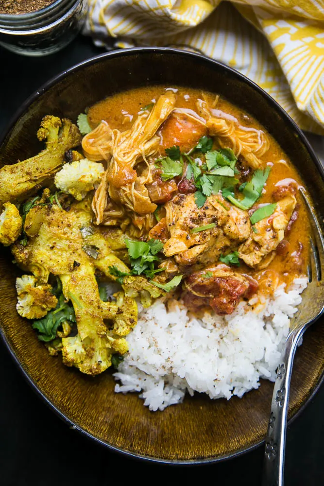 All you need is a head of cauliflower and some curry powder for a quick and easy side dish to serve alongside curry or anything off of the grill! | perrysplate.com #cauliflower #roastedvegetables