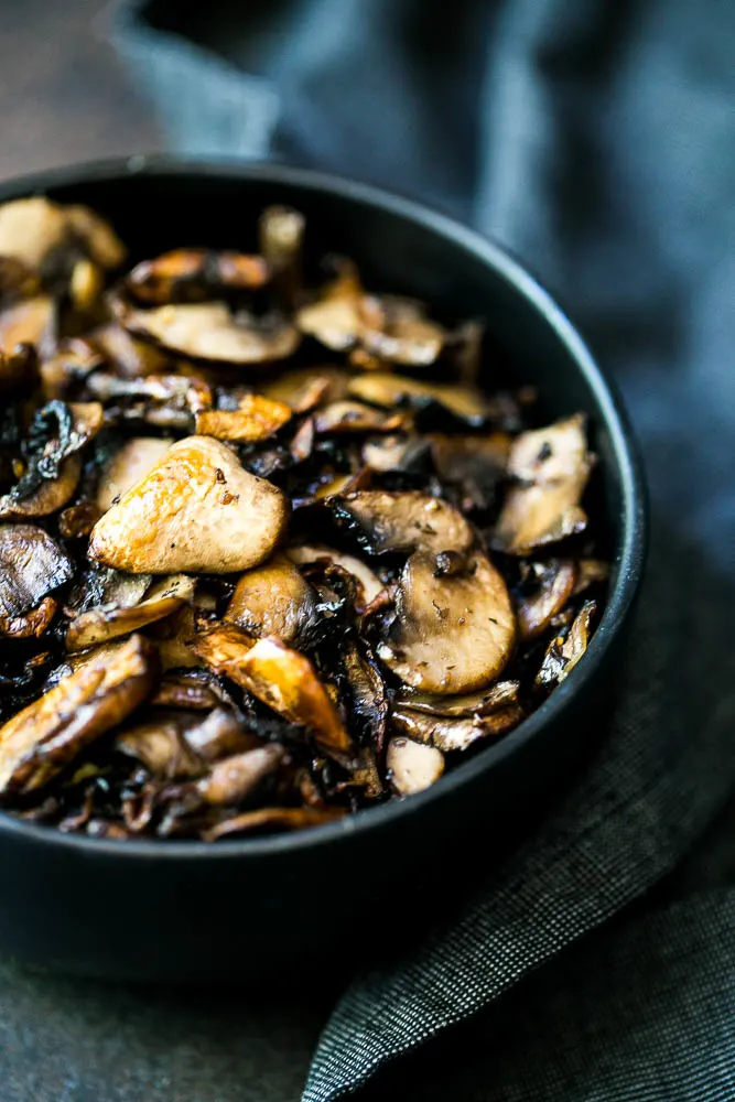 The BEST roasted mushrooms! They're super easy and great to use as a meal prep option to add spunk to your salads or other dishes.