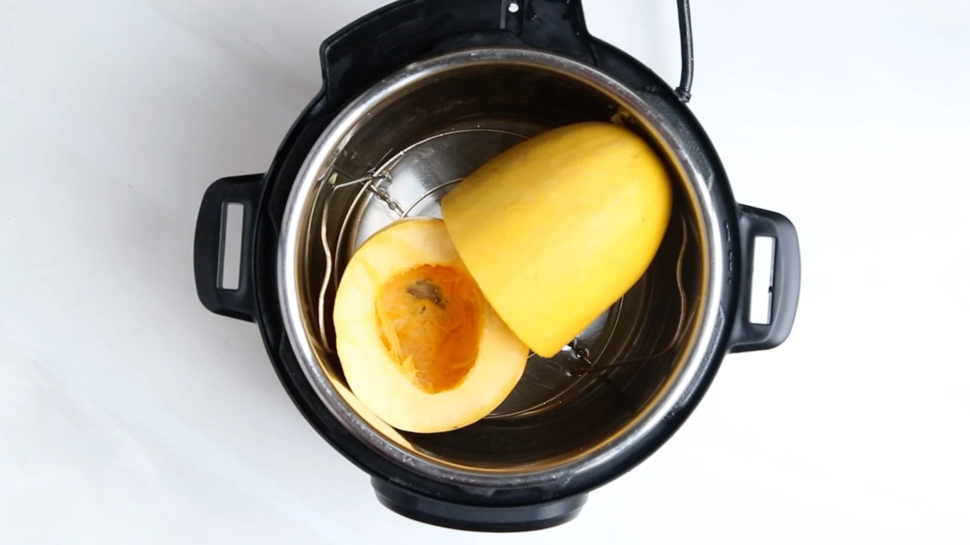 How to cook spaghetti squash in an Instant Pot. This method works well for any type of hard winter squash! | perrysplate.com