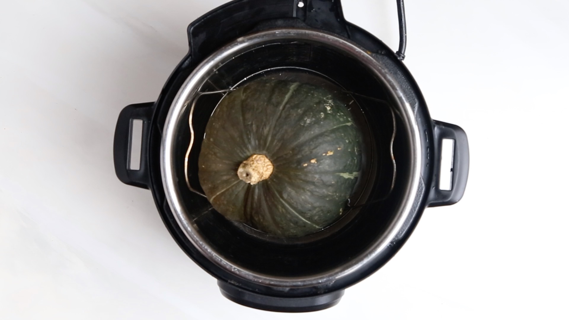 How to cook a kabocha squash in an Instant Pot. This method works well for all hard winter squash!