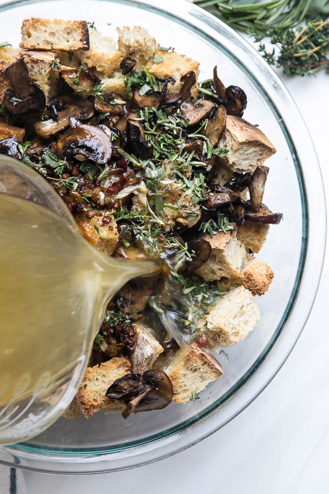 Stuffing made with sourdough bread is the best! This version has roasted garlic, roasted mushrooms, and salty pancetta mixed in. Perfect for a classic Thanksgiving side. | perrysplate.com Stuffing made with sourdough bread is the best! This version has roasted garlic, roasted mushrooms, and salty pancetta mixed in. Perfect for a classic Thanksgiving side. | perrysplate.com