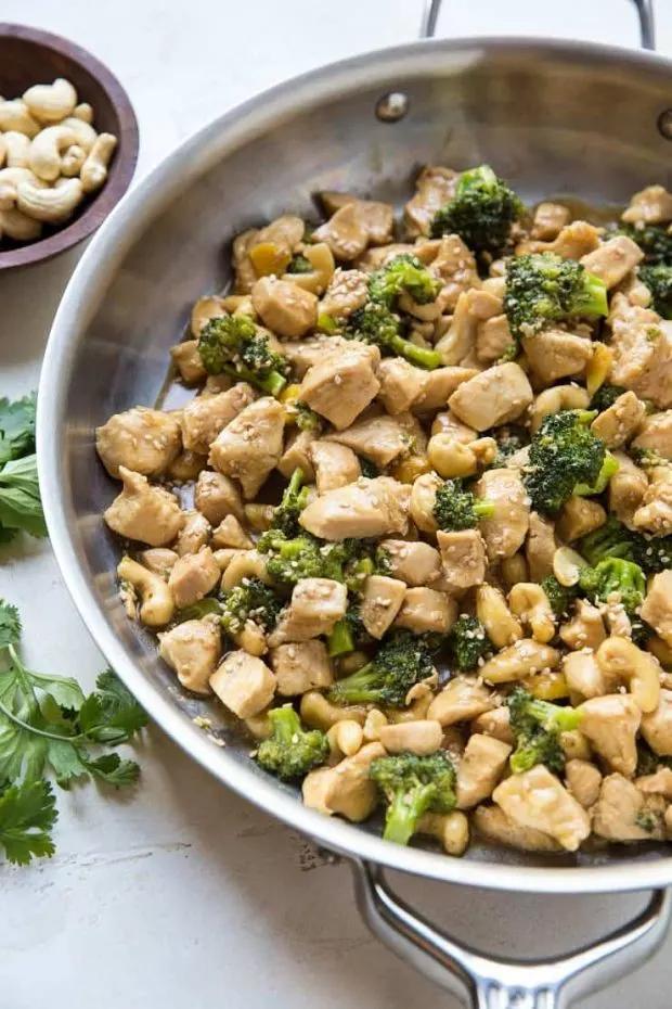 Sesame Ginger Cashew Chicken comes together in less than 40 minutes! Perfect for a healthy weeknight meal.