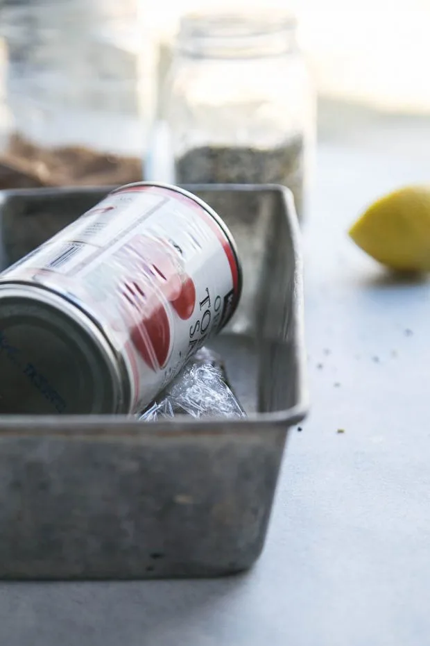 It's important to compress the salmon during curing -- I use a can of tomatoes. It's important to compress the salmon during curing -- I use a can of tomatoes.