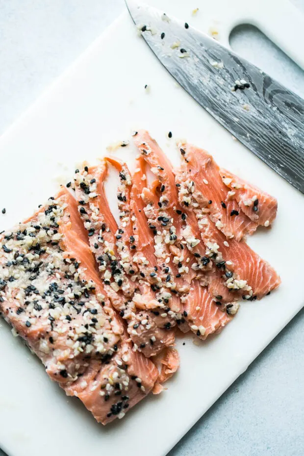 Slice the cured salmon very thinly before serving! Homemade salmon is easy to make and has lots of uses. 