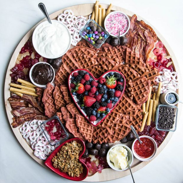 Create a fun breakfast board for Valentine's Day with your favorite waffles or pancakes! 