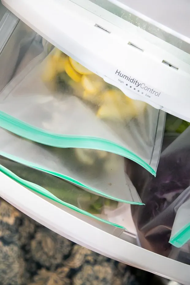 Storing chopped vegetables in reusable storage bags saves space in your refrigerator!