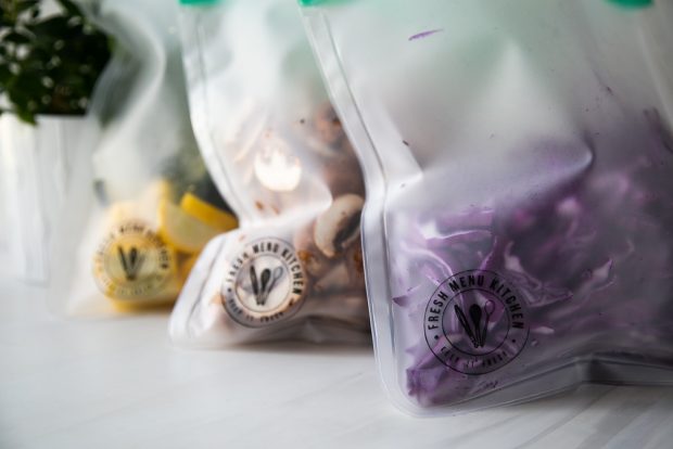 Storing chopped vegetables in reusable storage bags saves space in your refrigerator!