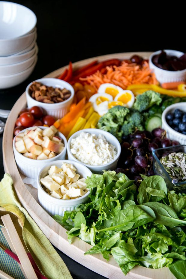 Charcuterie board filled with colorful vegetables perfect for spring or summer!