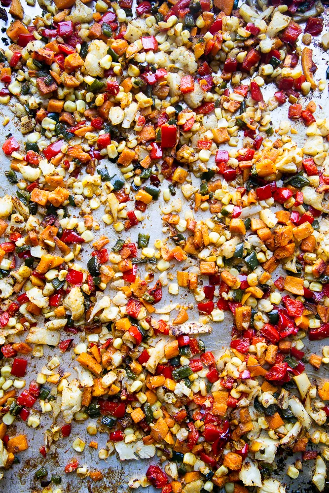 Lots of chopped, roasted vegetables ready to be made into Roasted Vegetable Enchiladas