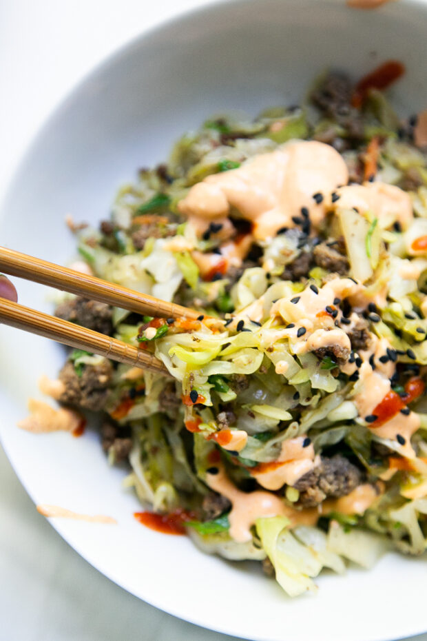 We love using chopsticks to eat Egg Roll Bowls. It's one of our famiy's favorite healthy meals and paleo-friendly.