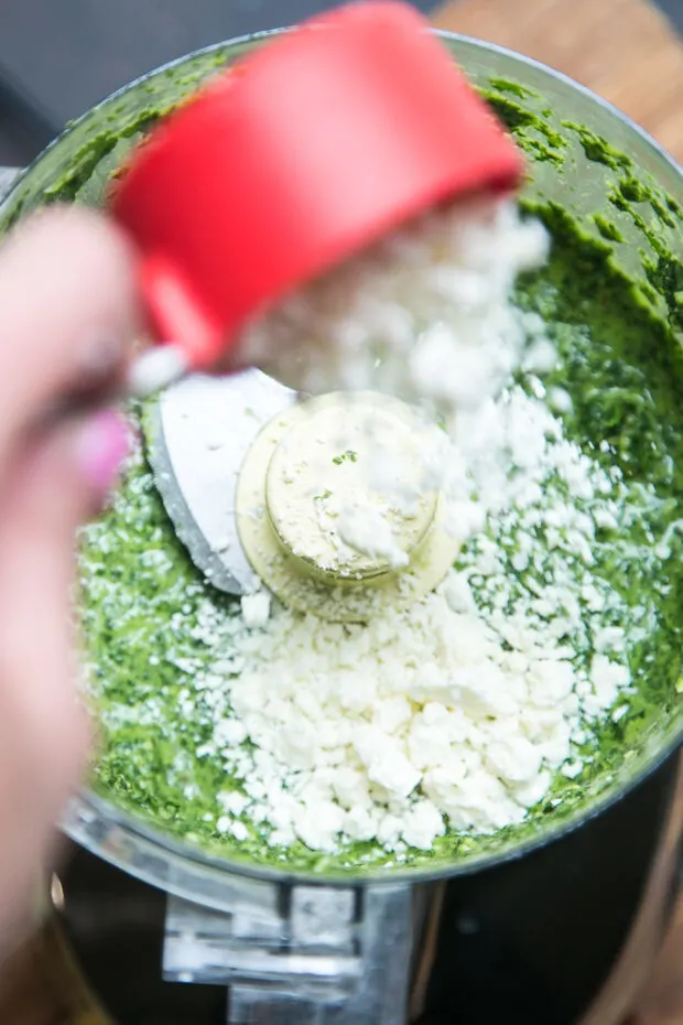 Add some avocado oil and cotija cheese to the cilantro pesto to add some nice salty flavor and thicken it up.
