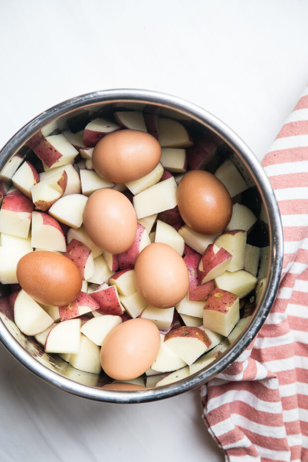 Cook the potatoes and eggs together in your Instant Pot to make this even easier! No more handling a big pot of boiling water!