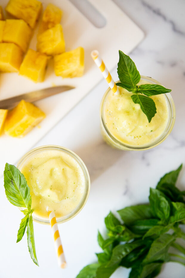 This pineapple smoothie is easy to make and has a hint of basil -- an unexpected, but delicious addition! It's also dairy-free and naturally sweetened.