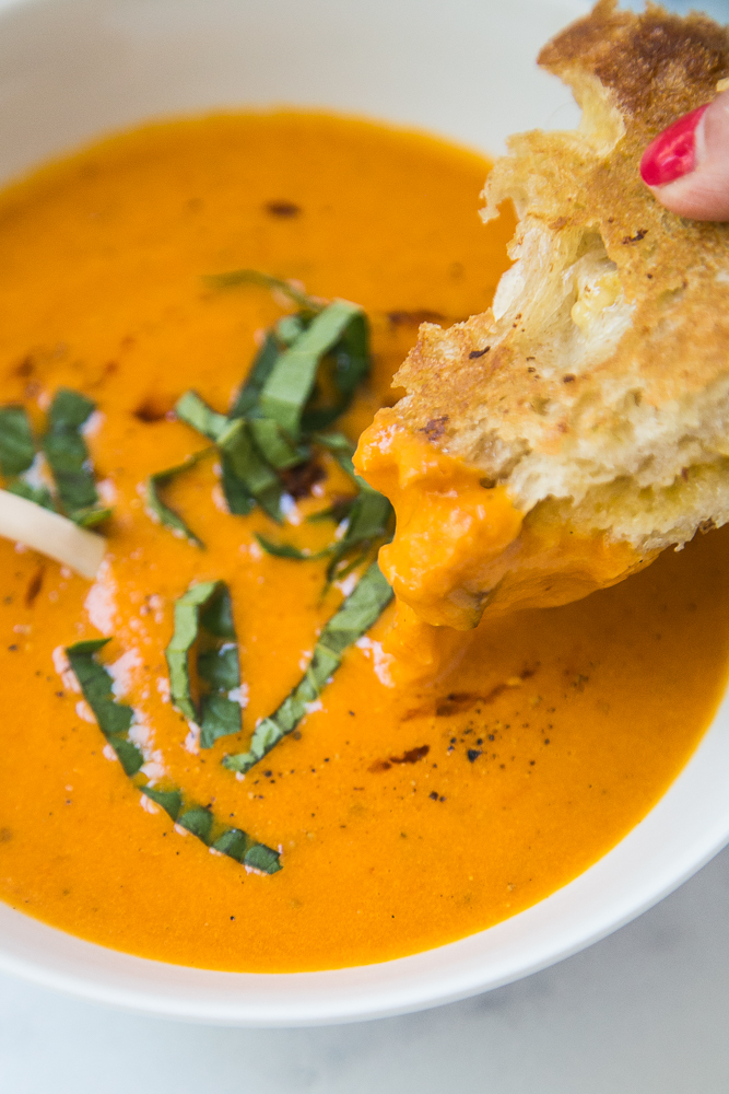 Grilled cheese and tomato soup is the best combination! This roasted tomato soup freezes well and makes a great meal for a new mom.