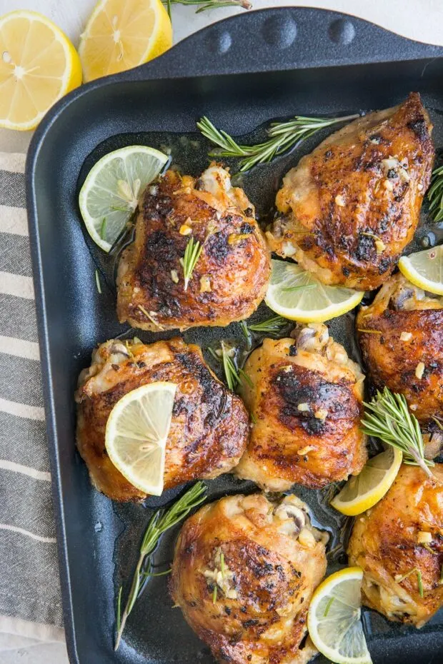 Baked Lemon Garlic Rosemary Chicken -- a fancy, yet EASY part of this week's FREE paleo meal plan.