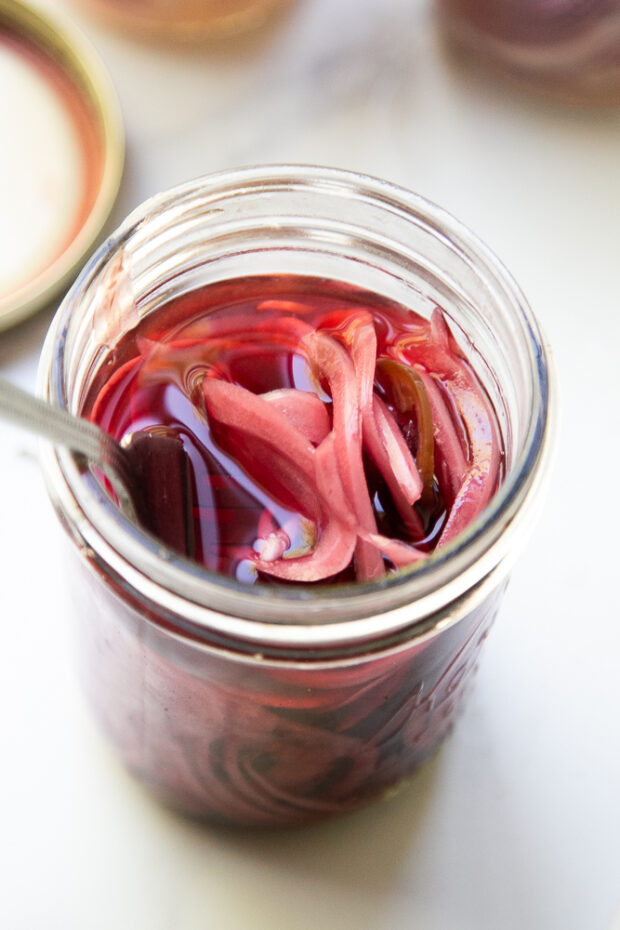 After a day or two the pickled red onions are ready to eat! They'll last up to 3 weeks in the fridge.