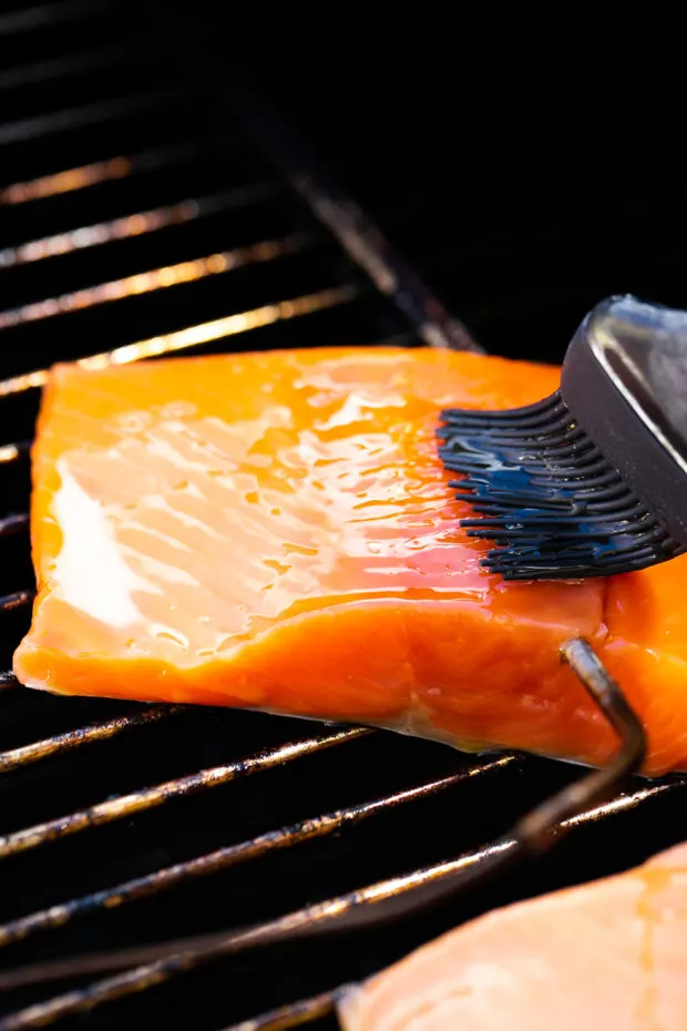 Maple syrup brushed on a salmon fillet.