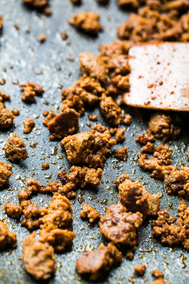 Mexican turkey chorizo cooking in a nonstick pan. It's got those tasty crispy bits on it.