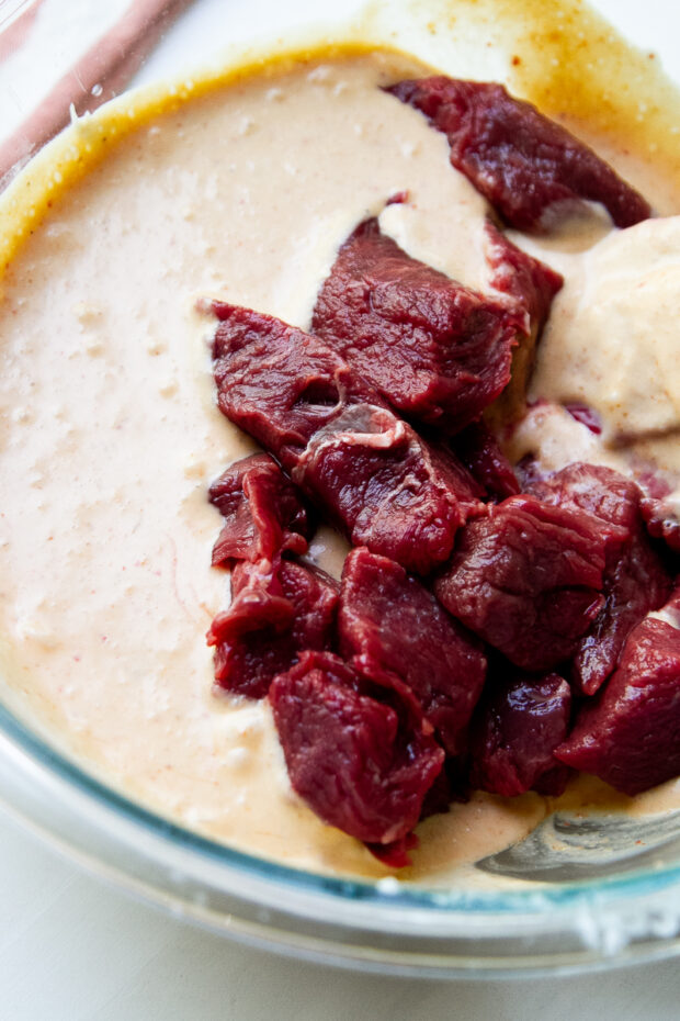 Pieces of sirloin steak in a Thai coconut curry marinade