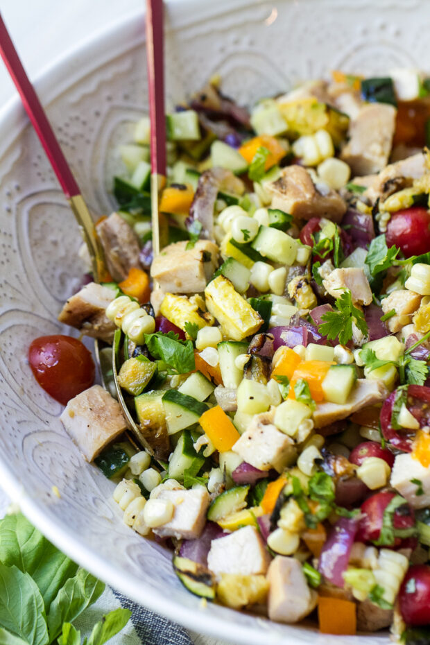 Close up view of the finished grilled vegetable salad with rotisserie chicken.