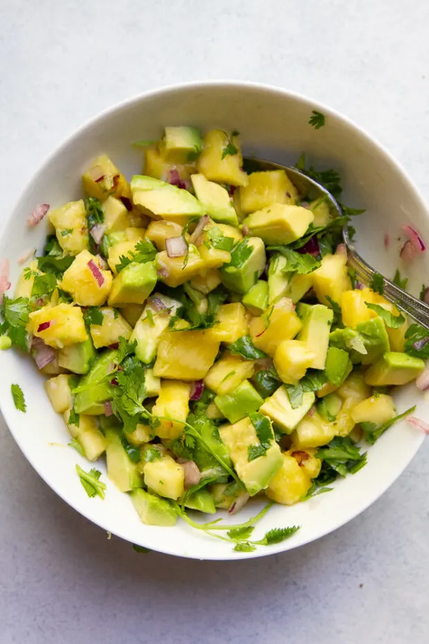 Pineapple Avocado Salsa in a bowl ready to eat.