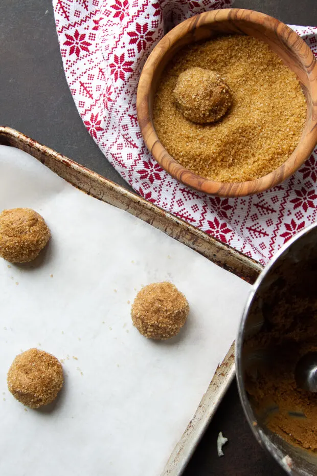 Ginger molasses cookie dough rolled into balls and coated with turbinado sugar.