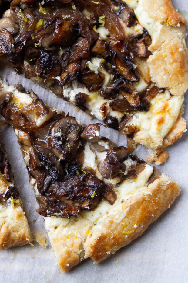 Finished mushroom galette sliced into wedges.